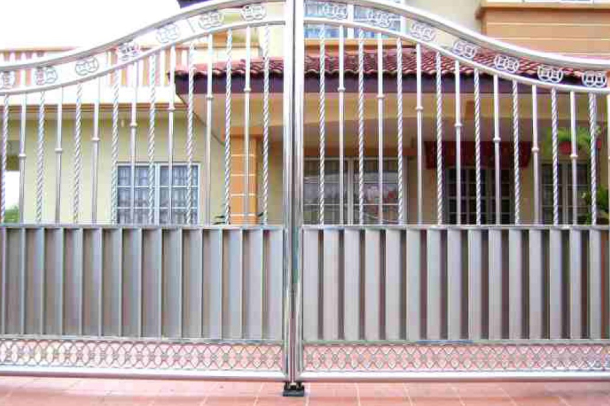 Beautifully designed steel gate in front the residential house